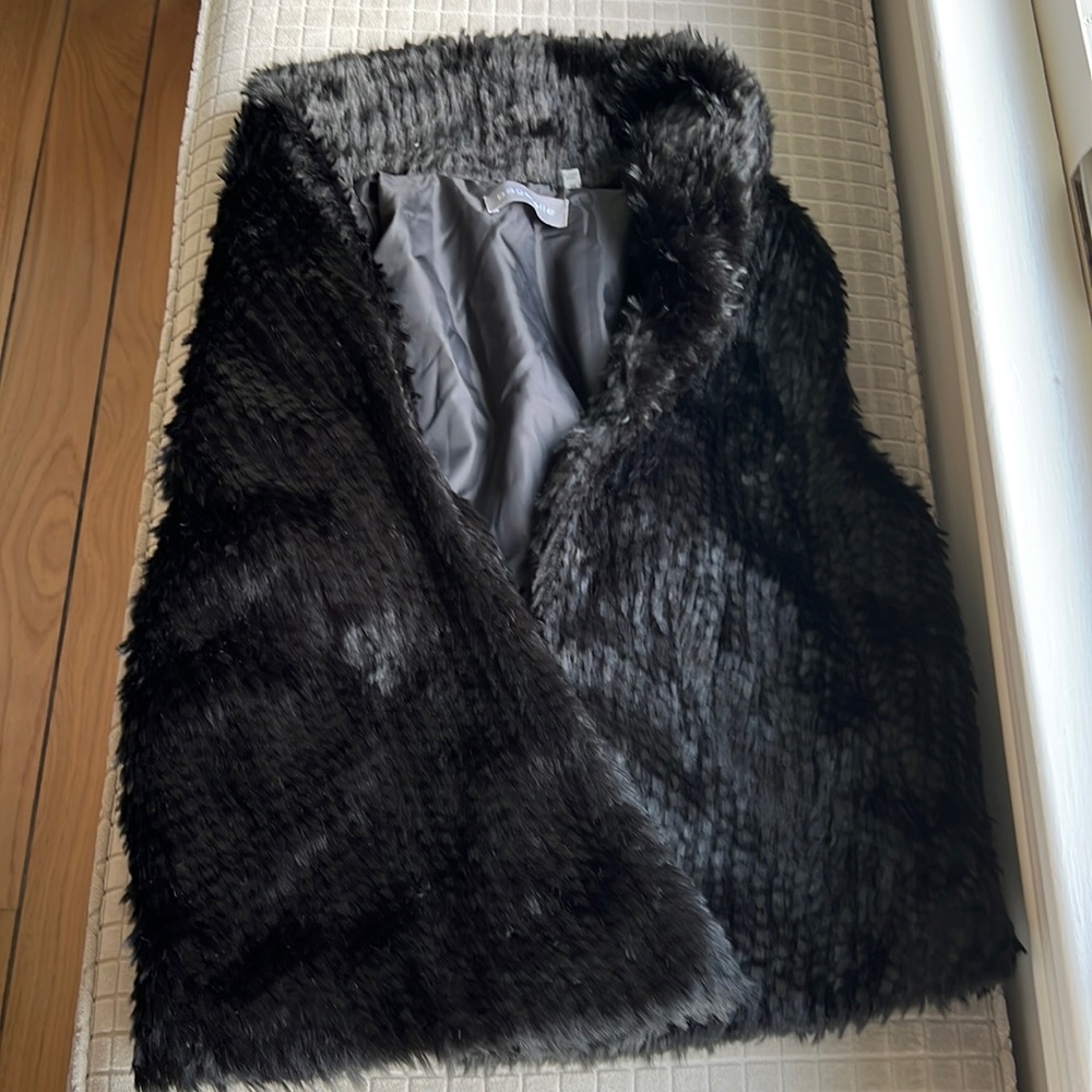Black faux fur vest